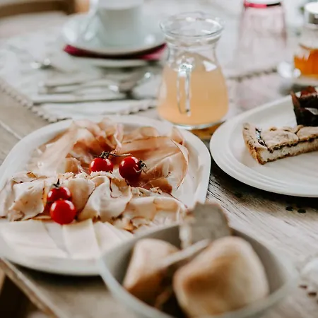 Alojamento de Acomodação e Pequeno-almoço Fra Rose E Mughi *